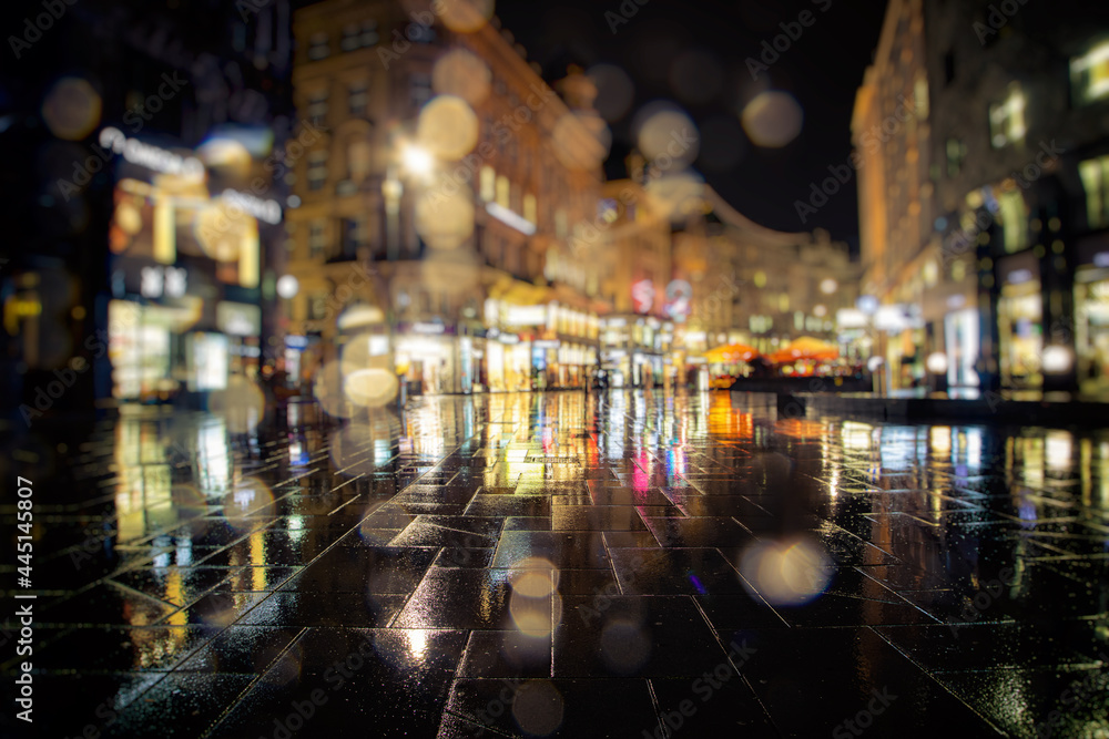 Naklejka premium city streets on rainy night 