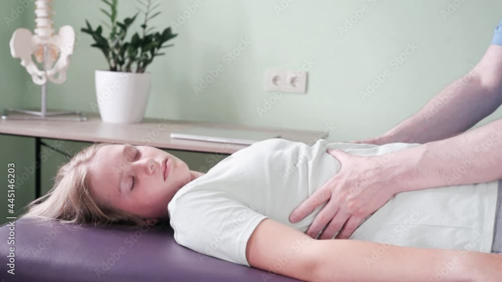 Myofascial Release of the tight Diaphragm, Osteopath practitioner using