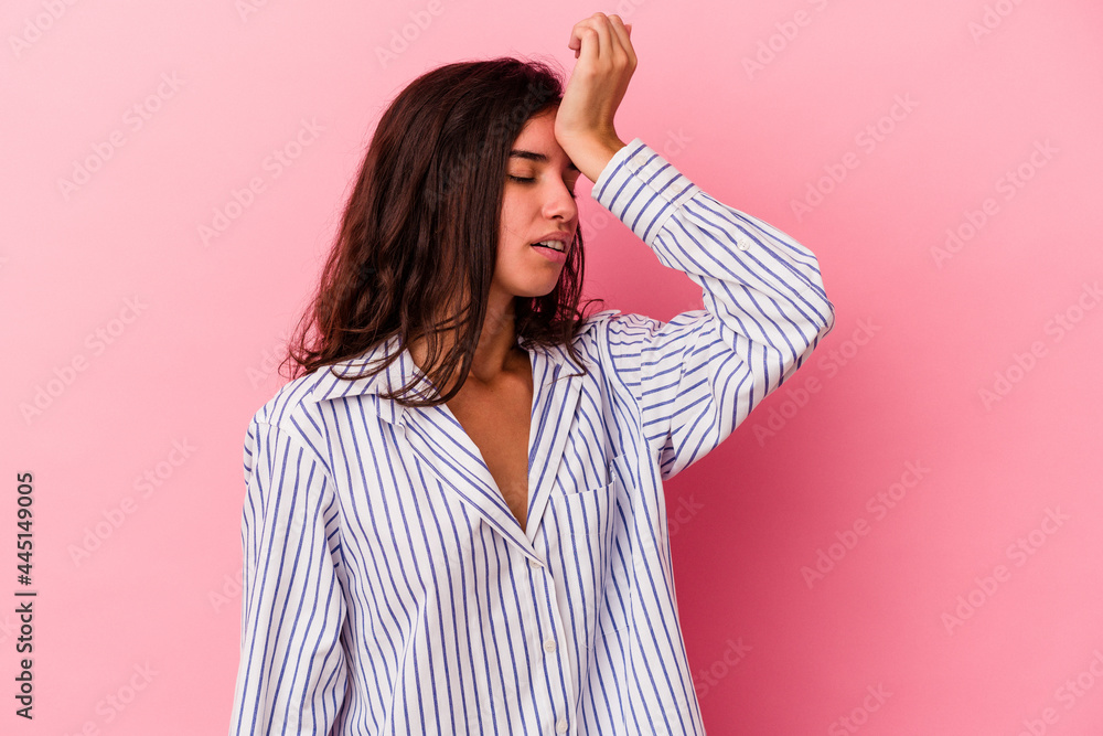 Young caucasian woman isolated on pink background forgetting something, slapping forehead with palm and closing eyes. Young caucasian woman isolated on pink background forgetting something, slapping forehead with palm and closing eyes.