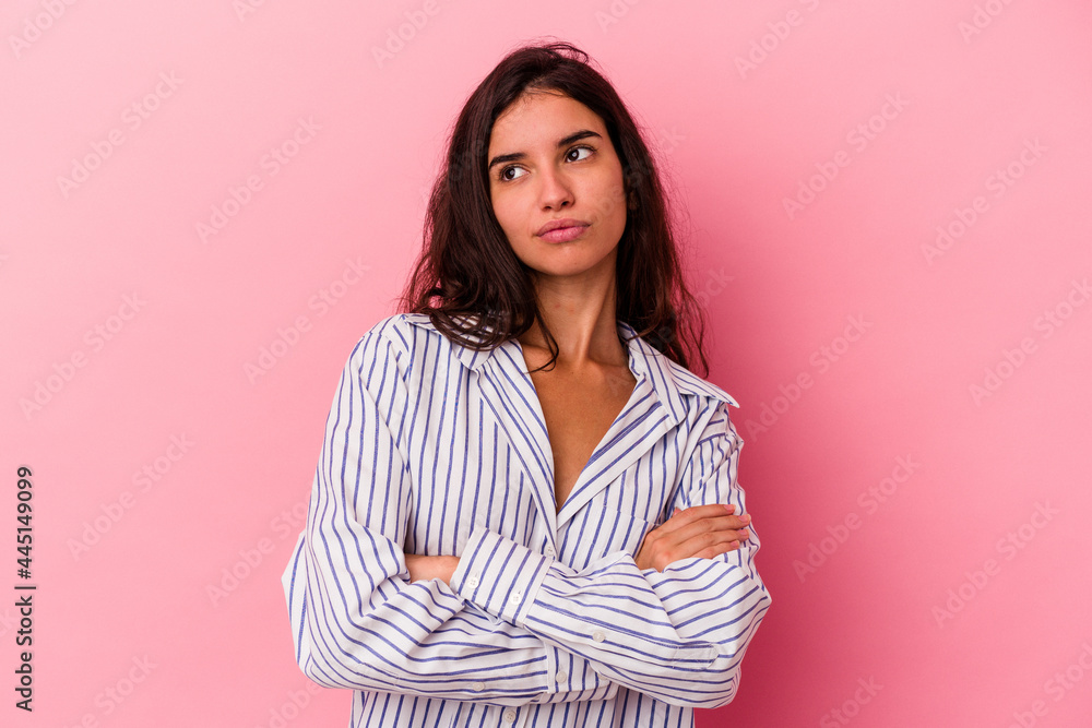 Young caucasian woman isolated on pink background dreaming of achieving goals and purposes Young caucasian woman isolated on pink background dreaming of achieving goals and purposes