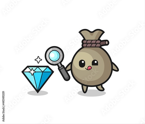 money sack mascot is checking the authenticity of a diamond © heriyusuf
