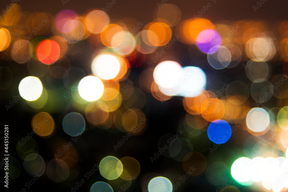 Blurred street bokeh lights at night time Blurred street bokeh lights at night time