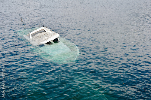Power boat sinked in the sea coast of Hondarribia, Basque country, Spain.
