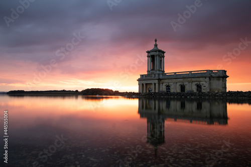 Sunset over a lake and church