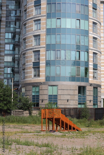 Wooden children's slide in the courtyard of a residential building, Kirochnaya ulitsa 64, St. Petersburg, Russia, July 2021 photo