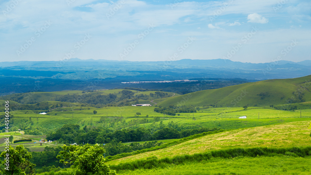 landscape with green field and blue sky landscape with green field and blue sky