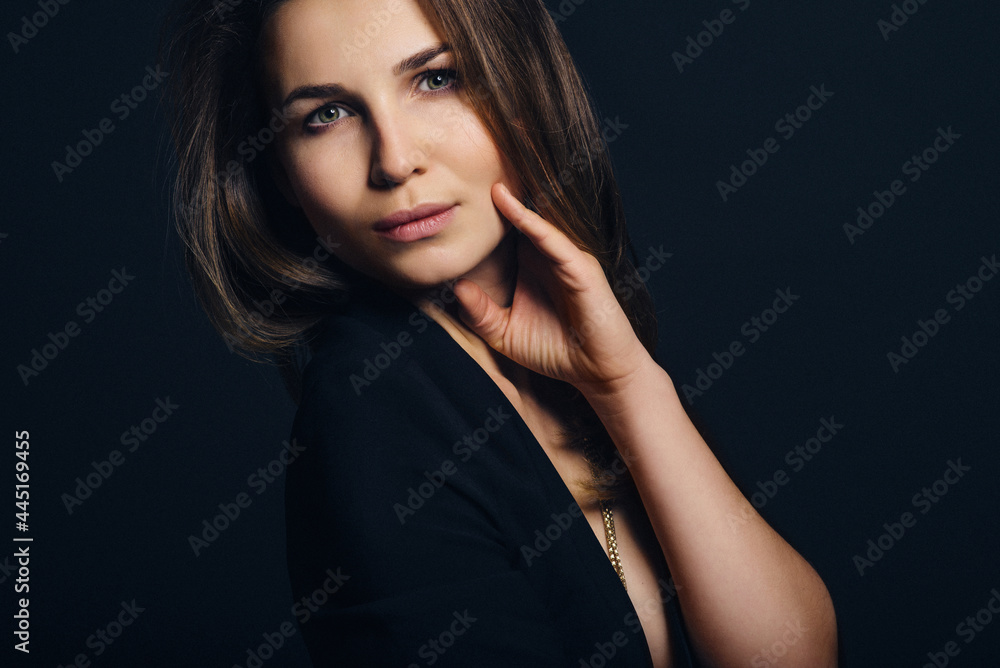 Fototapeta premium girl brunette beauty model in a black jacket