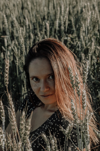 Russian girl in a field with wheat - here she is real freedom