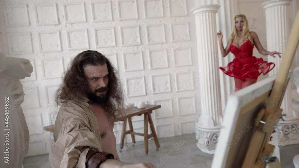 crazy artist is working in his workshop, painting beautiful lady from life, drawing portrait crazy artist is working in his workshop, painting beautiful lady from life, drawing portrait