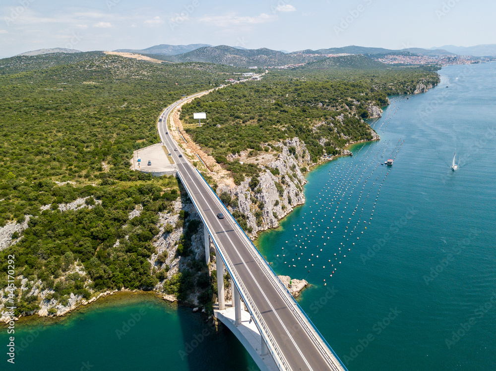 Aerial view of Sibenski Most, croatian bridge. Road and cars. Sibenski, Croatia. Central Dalmatia, where the river Krka flows into the Adriatic Sea
