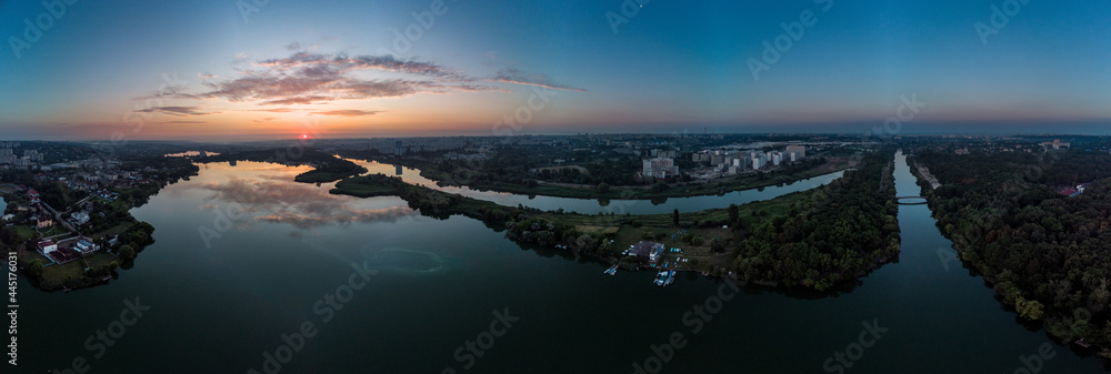 Aerial scenic sunrise panorama on Kharkiv river. Dawn in Kharkiv Zhuravlivskyy Hidropark
