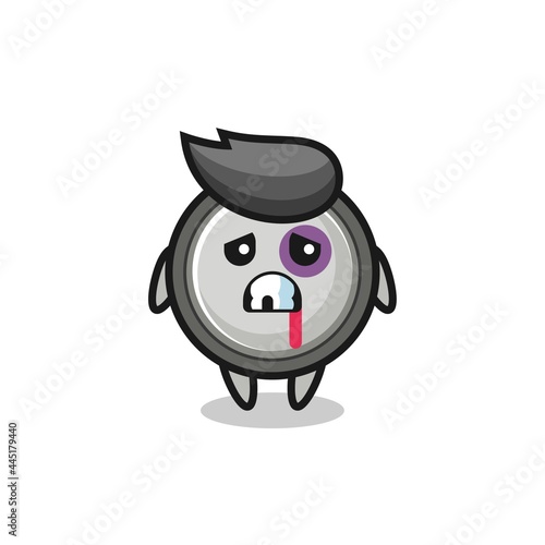 injured button cell character with a bruised face