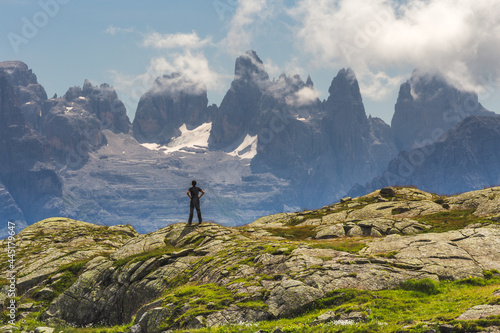 Trekking on the italian mountains. Resting and admire the astonishing view, Brenta