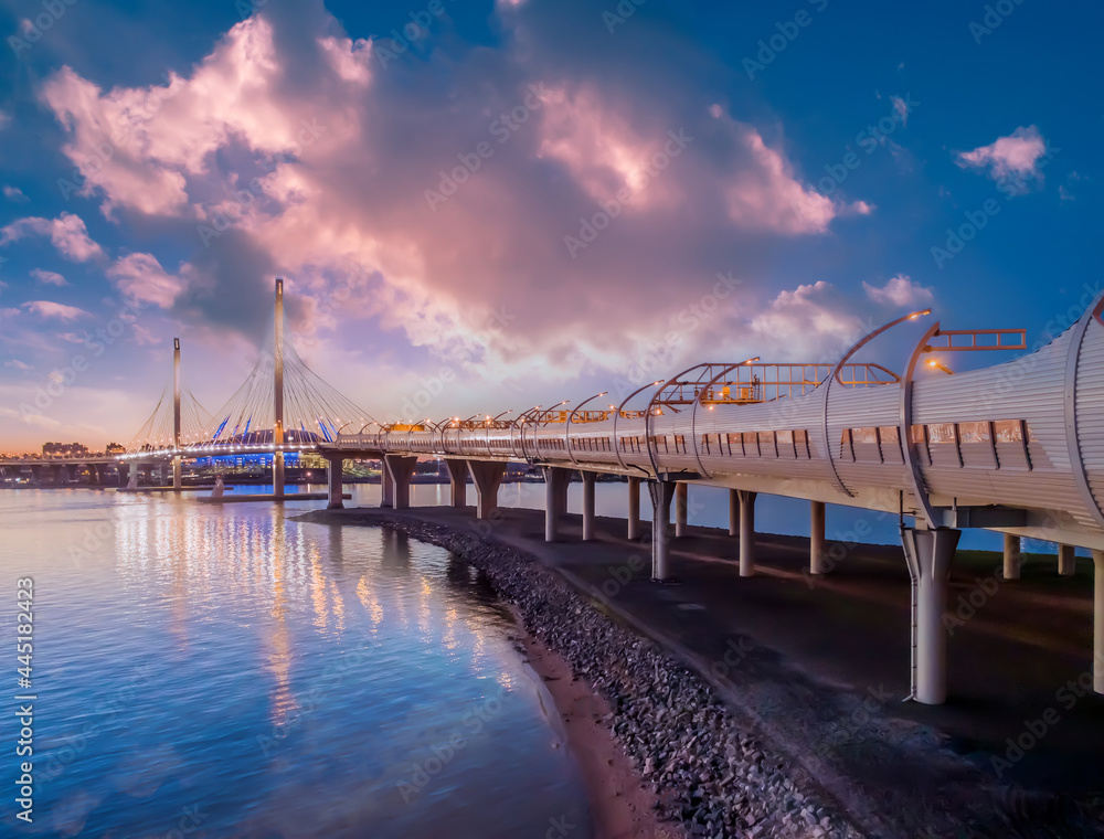 Morning Saint Petersburg. Road Russia. Automotive bridge bottom view. Cable-stayed bridge over bay. Traveling around Saint Petersburg by car. Bridge to Krestovsky Island. Roads of Russian Federation