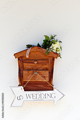 Wedding decoration. Wooden board with the inscription Wedding. White background. Czech Republic. Europe.