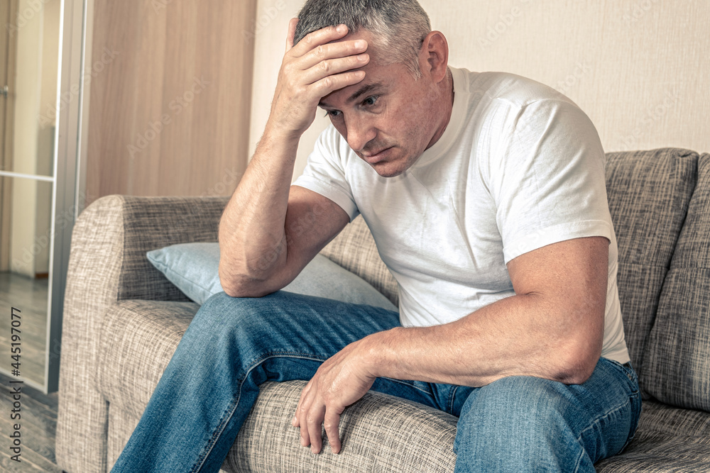 A man with a detached look. Depression, poor health. Apathetic state. The concept of a mental disorder. A man with a detached look. Depression, poor health. Apathetic state. The concept of a mental disorder.