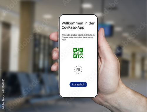 Stuttgart,Baden Württemberg , Germany-2021 Vaccination passport application in Germany. Vaccination passport application. a phone in hand and the covpass app on its screen 3d illustration