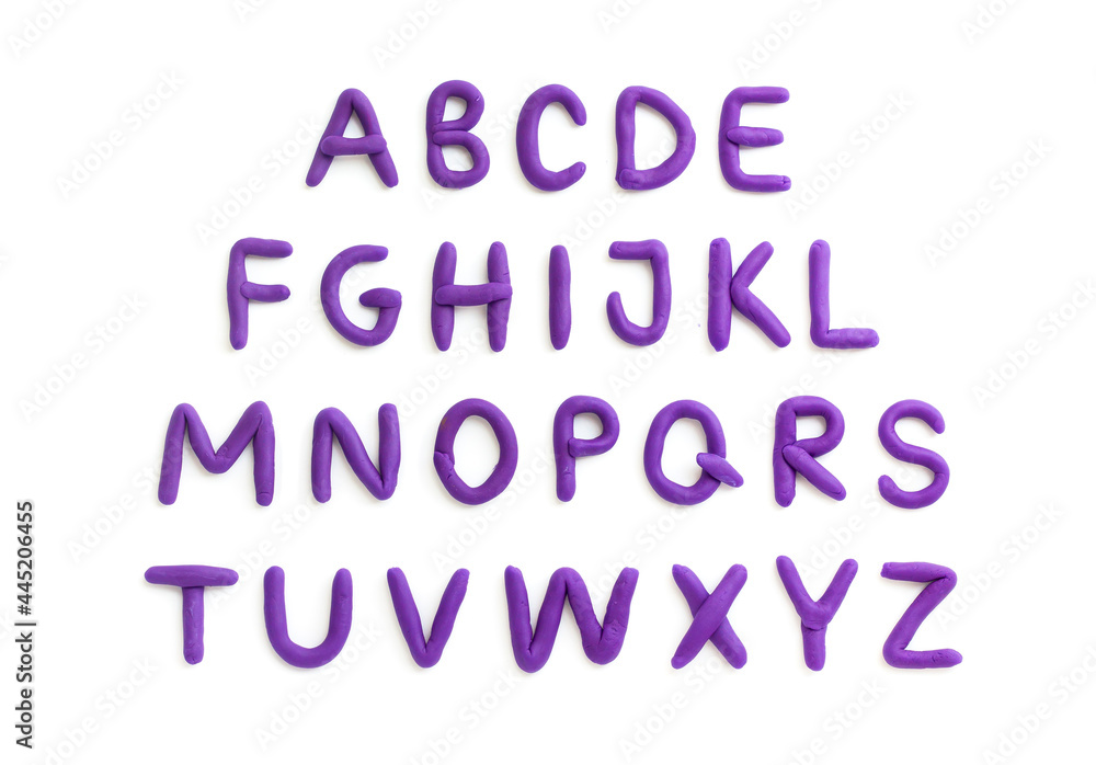 Plasticine english alphabet A-Z. Purple handmade latin letters isolated on white background.