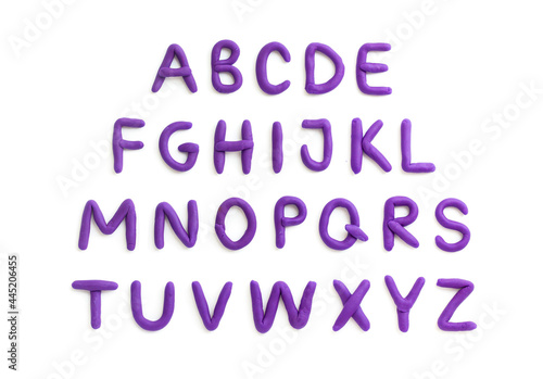 Plasticine english alphabet A-Z. Purple handmade latin letters isolated on white background.