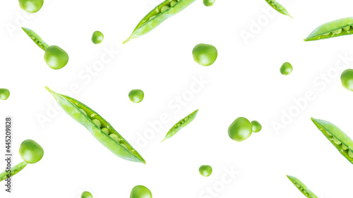 Green peas isolated on a white background. Flying green peas. Falling green peas.