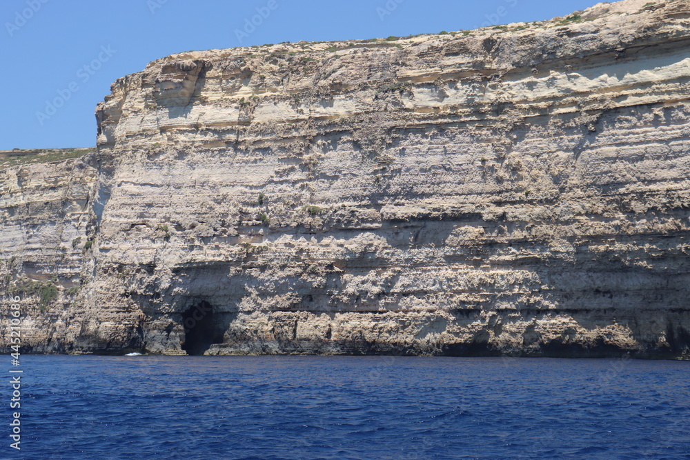 Gozo Inland Sea Divesite rock shore, inside sea from the cave view