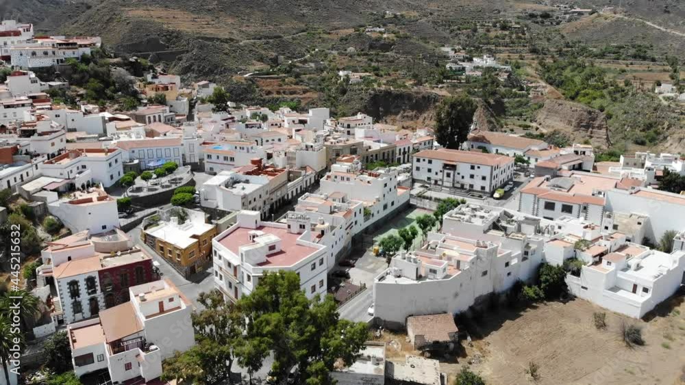 Aerial view of Small town beautiful and peaceful in a valley on Gran Canaria. Bartolome de Tirajana panoramic old village. Drone sight of tourism neighbourhood in canary islands. Aerial view of Small town beautiful and peaceful in a valley on Gran Canaria. Bartolome de Tirajana panoramic old village. Drone sight of tourism neighbourhood in canary islands.