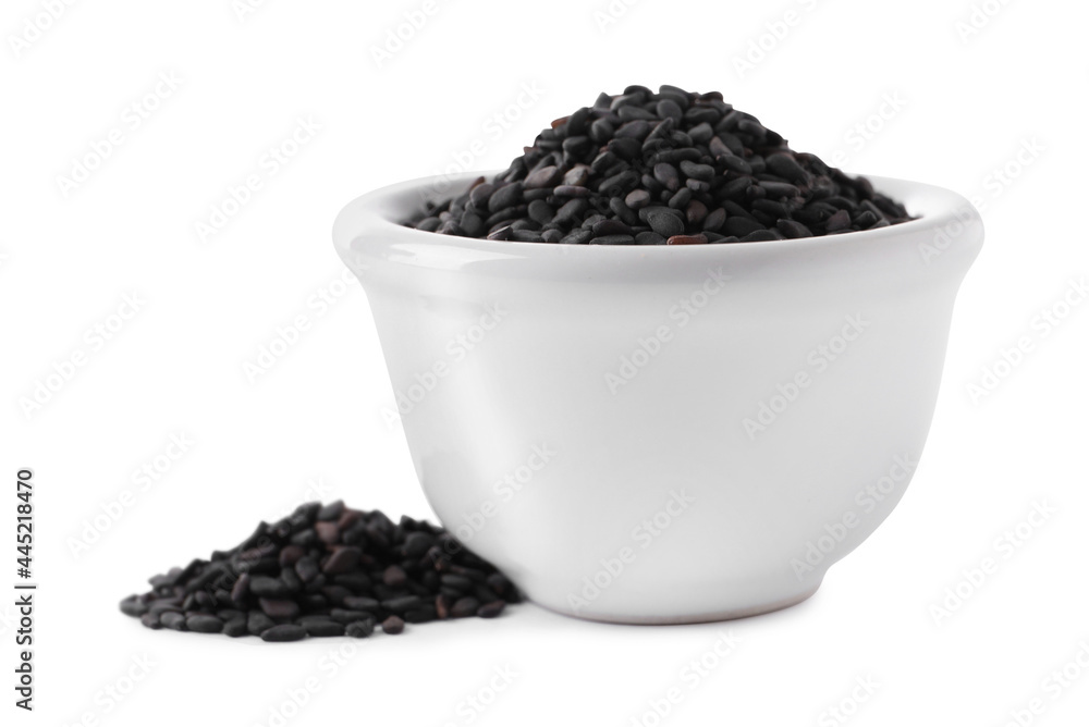 Raw black sesame seeds with bowl on white background Raw black sesame seeds with bowl on white background