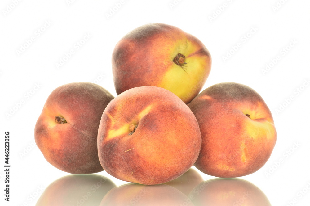 Several ripe organic peaches, close-up, isolated on white. Several ripe organic peaches, close-up, isolated on white.