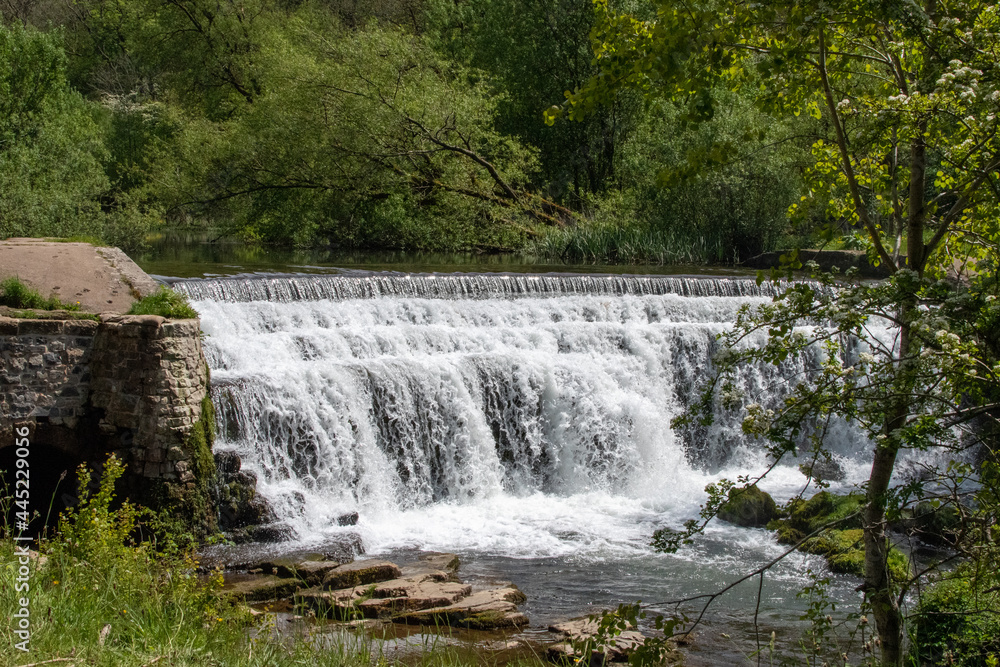Monsal Dale Weir waterfall in Derbyshire, UK Monsal Dale Weir waterfall in Derbyshire, UK