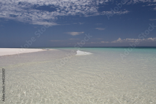 Pristine white sand beach and sea photo