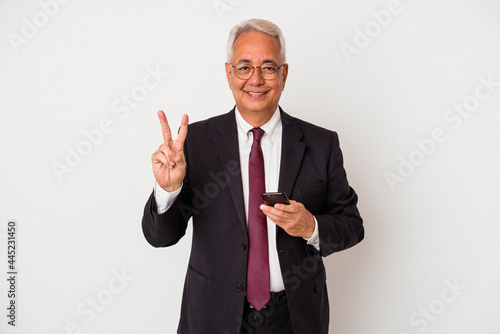 Senior business american man holding mobile phone isolated on white background showing number two with fingers.
