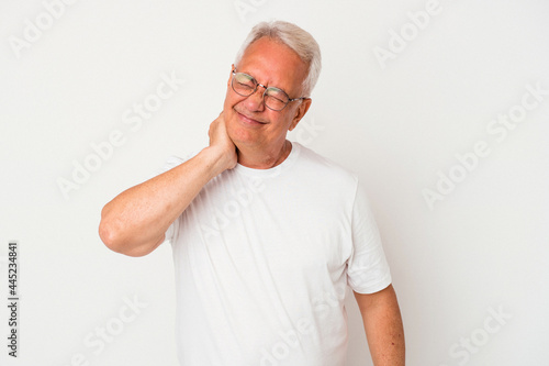 Senior american man isolated on white background having a neck pain due to stress, massaging and touching it with hand.