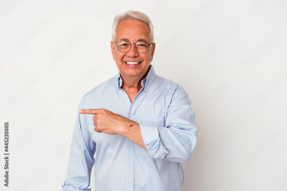 Senior american man isolated on white background smiling cheerfully pointing with forefinger away. Senior american man isolated on white background smiling cheerfully pointing with forefinger away.