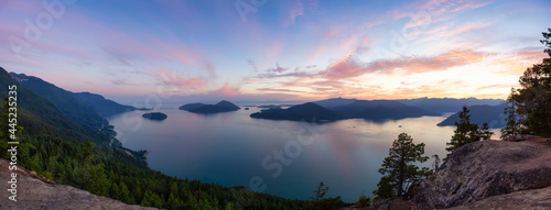 Tunnel Bluffs Hike, in Howe Sound, North of Vancouver, British Columbia, Canada. Panoramic Canadian Mountain Landscape View from the Peak during sunny summer sunset.