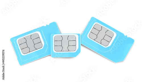 Plakat Light blue SIM cards on white background, top view