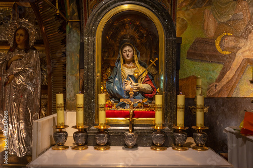 Our Lady of Sorrows statue in Golgotha, The Church of the Holy Sepulchre is a church in the Christian Quarter of the Old City of Jerusalem. israel june 2021