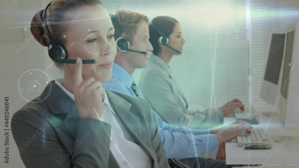 Animation of network of connections over business people wearing phone headsets Animation of network of connections over business people wearing phone headsets
