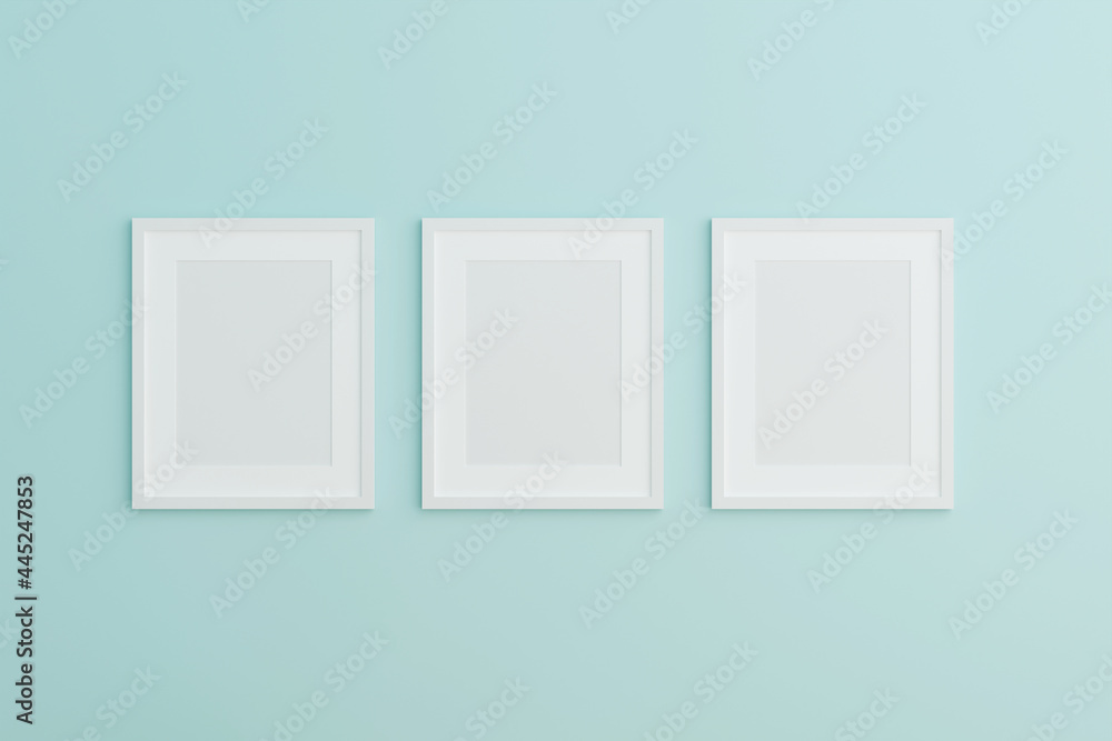 Blank picture frame mock up on the blue wall. 3d rendering. Blank picture frame mock up on the blue wall. 3d rendering.