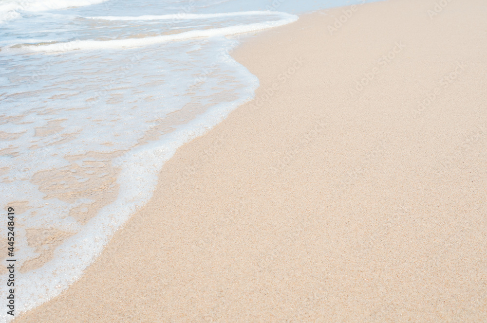 Soft sea wave on clean sandy beach Soft sea wave on clean sandy beach