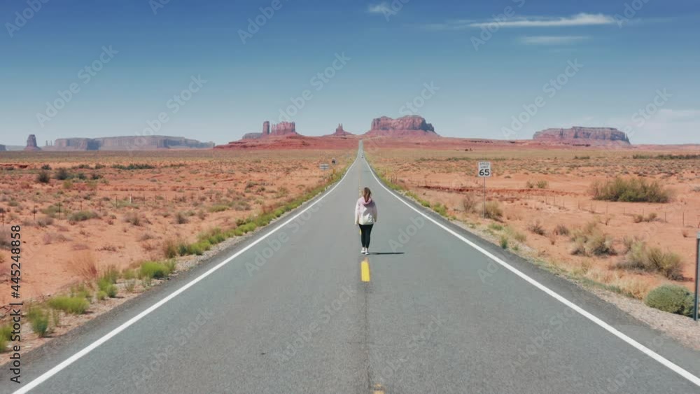 Happy tourist excited to see famous filming landmark cinematic Monument Valley Happy tourist excited to see famous filming landmark cinematic Monument Valley