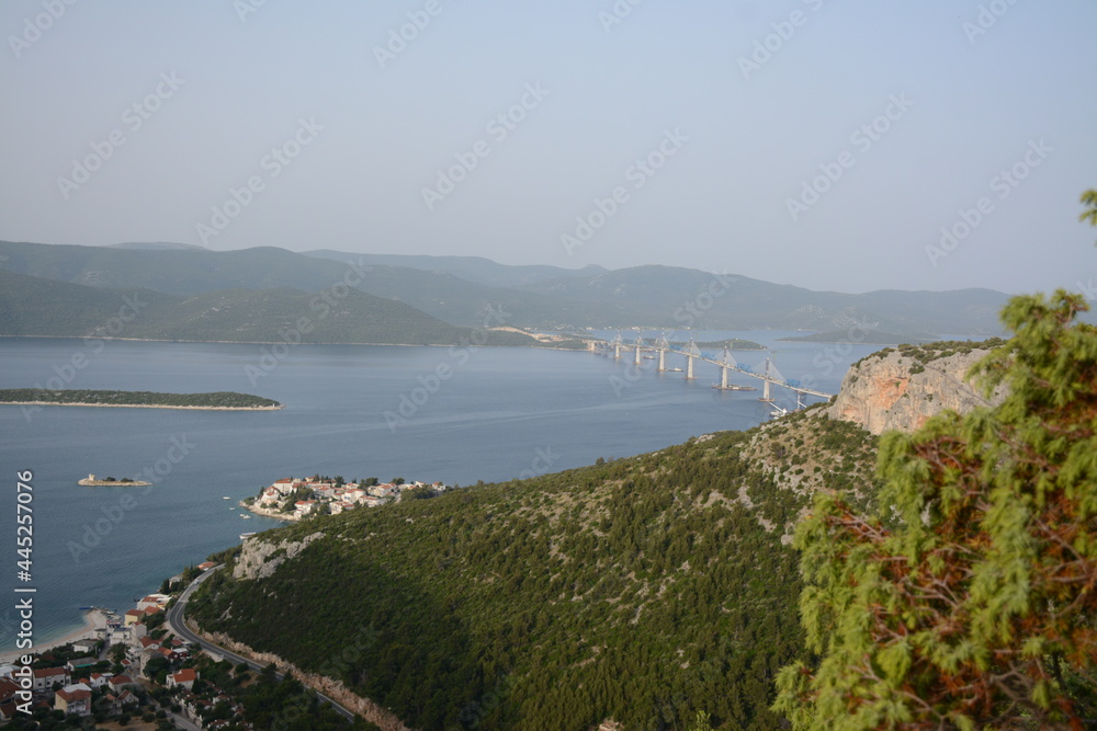 Beautiful view of the mountains, the sea, the bridge and the village of Klek in Croatia and mi