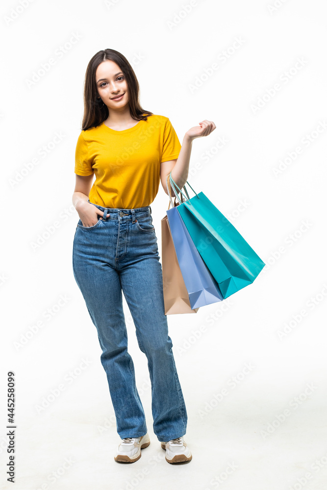 Portrait of young smiling woman with shopping bags Portrait of young smiling woman with shopping bags