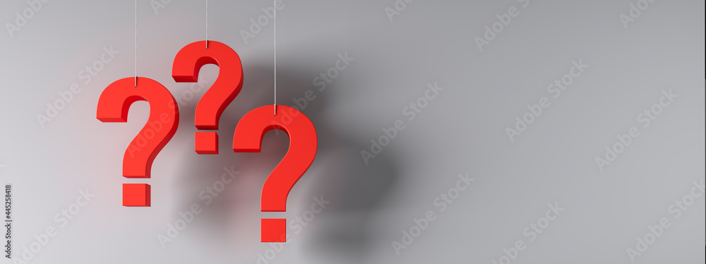 Three red question marks in front of a gray wall Three red question marks in front of a gray wall