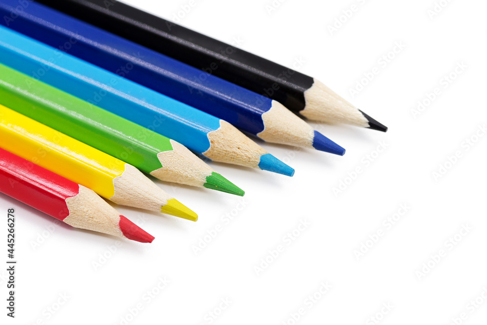Colored pencils on a white background. Colored pencils on a white background.