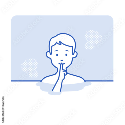 静かに黙浴をして温泉に入浴する若い男性