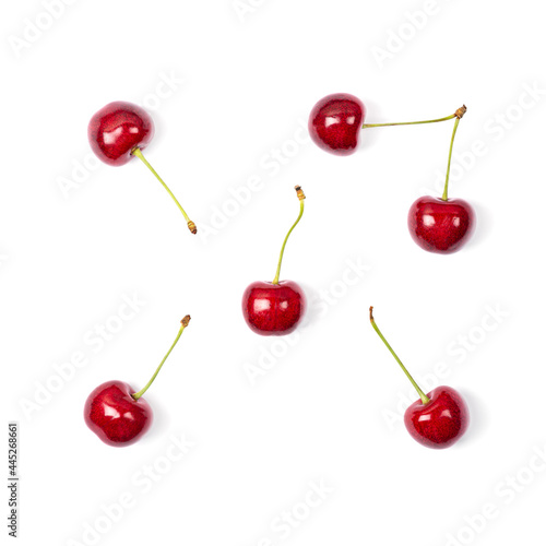 Ripe red sweet cherry isolated on white background. Macro photo close up. Six cherries on white background.