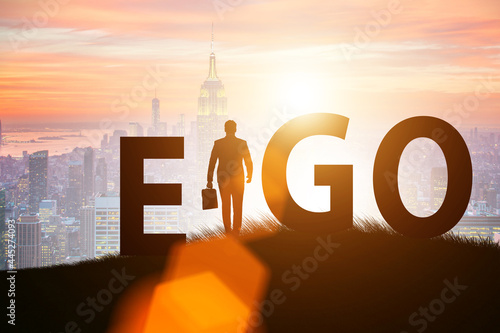 Concept of ego with businessman photo