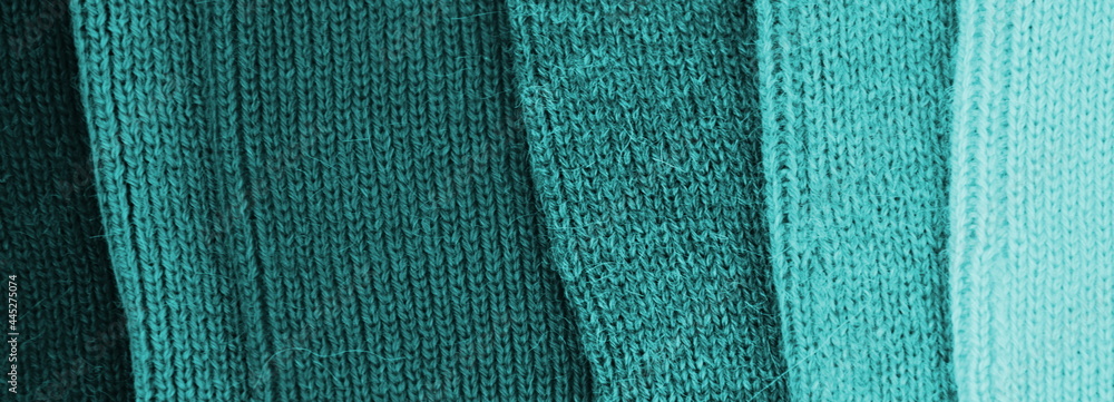 Hintergrund Strickwaren aus Wolle, gestrickt, Muster in blau und türkis, Handarbeit Gestrickte Textur, Hintergrund, Wolle, Wollpullover, Stricken Hintergrund Strickwaren aus Wolle, gestrickt, Muster in blau und türkis, Handarbeit Gestrickte Textur, Hintergrund, Wolle, Wollpullover, Stricken