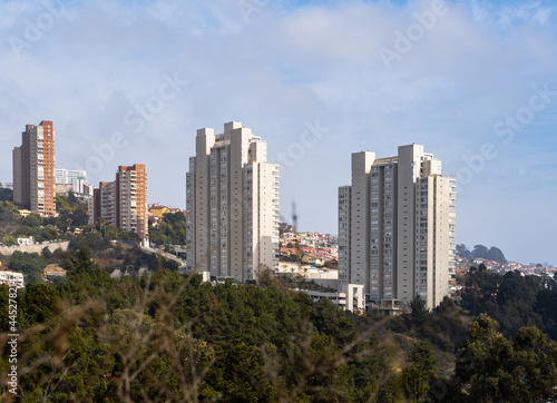 Horizontal view of a residential complex surrounded by nature