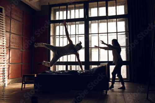 couple having fun in bedroom